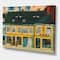 Designart - Yellow Facade of Houses In Street In Paris - French Country Canvas Wall Art Print